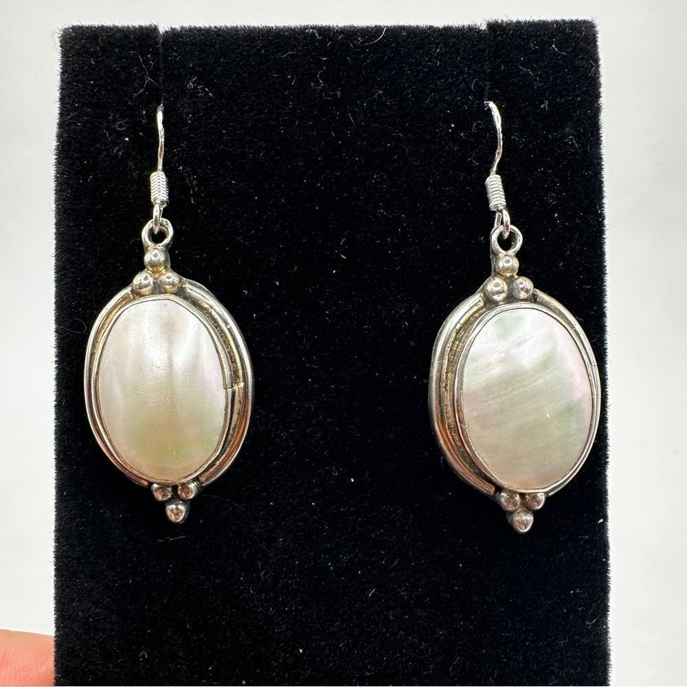 1.75" Mother of Pearl and solid back sterling silver dangle earrings!